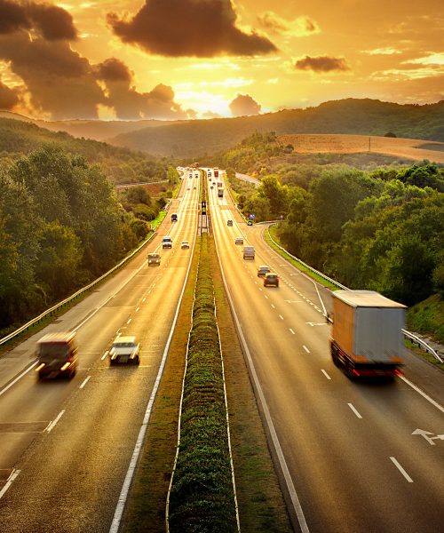 Highway traffic in sunset